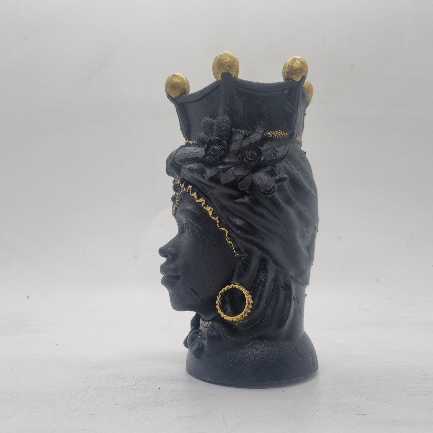 Black and gold Testa di Moro. Female Moorish head, African lady statue, womans head bust, 3d printed Sicillian sculpture, art and culture.