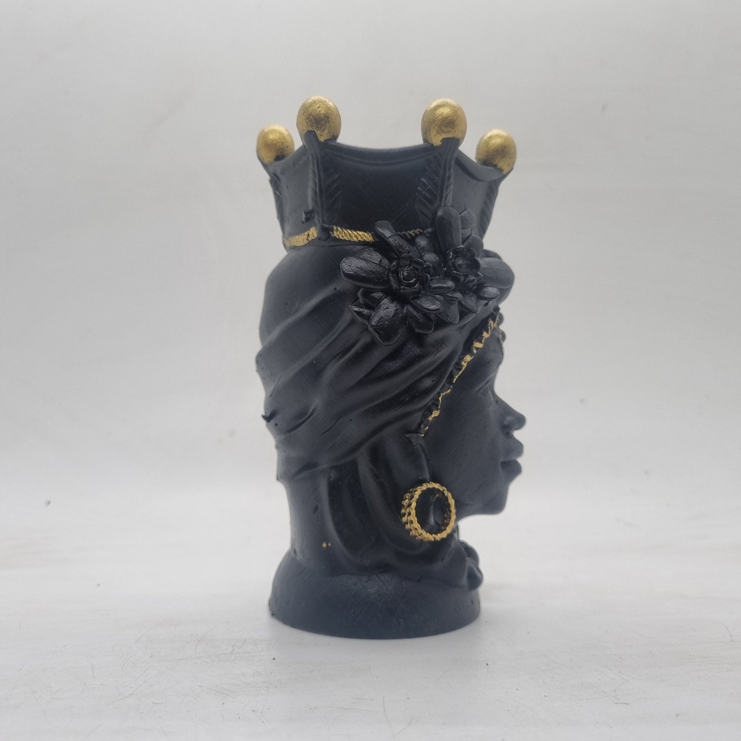 Black and gold Testa di Moro. Female Moorish head, African lady statue, womans head bust, 3d printed Sicillian sculpture, art and culture.